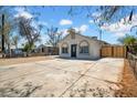 Inviting single-level home featuring a large concrete driveway and low maintenance yard at 538 S Macdonald --, Mesa, AZ 85210
