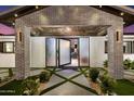 Inviting entryway showcasing modern design and lush landscaping at 8708 E Rancho Vista Dr, Scottsdale, AZ 85251