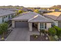 A lovely home featuring desert landscaping and a well-maintained tile roof at 13330 W Milton Dr, Peoria, AZ 85383