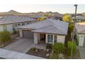 A lovely home featuring desert landscaping and a well-maintained tile roof at 13330 W Milton Dr, Peoria, AZ 85383