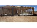 Exterior view of the home in construction, showing framing and foundation on a sunny day at 16189 W Bajada Rd, Surprise, AZ 85387