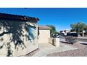Home's exterior featuring a desert landscape and views of neighboring houses at 1630 W Pecan Rd, Phoenix, AZ 85041