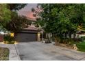 Beautiful two-story home with a tile roof and a spacious three-car garage at 5139 S Marble St, Gilbert, AZ 85298