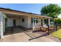 Inviting single-story home with covered parking and a cozy front patio at 743 W Ocotillo Rd, Phoenix, AZ 85013