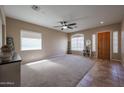 Bright and airy living room featuring neutral tones and plenty of natural light at 10465 E Knowles Ave, Mesa, AZ 85209