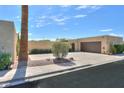 Charming single-story home with landscaped front yard, driveway, and an attached garage at 1131 N Cherry --, Mesa, AZ 85201