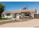 Attractive front exterior with desert landscaping, showcasing curb appeal and low maintenance at 1712 N Old Colony --, Mesa, AZ 85201