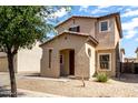 Charming two-story home with a covered porch and low maintenance gravel front yard at 21182 E Stonecrest Dr, Queen Creek, AZ 85142