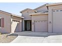 Single-Gathering home with a three-car garage and a well-maintained desert landscape at 24847 N 175Th Dr, Surprise, AZ 85387