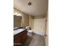Bathroom view showcases a vanity sink, toilet, and bathtub with shower at 3434 E Baseline Rd # 204, Phoenix, AZ 85042