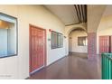 Hallway with unit 203 entrance, smooth flooring, and ambient lighting, creating a secure and comfortable access point at 424 S 2Nd St # 203, Phoenix, AZ 85004