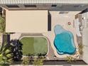 Aerial view showcasing the backyard, pool, putting green, patio, and privacy at 46141 W Rainbow Dr, Maricopa, AZ 85139