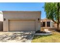 Charming single Gathering home featuring a two-car garage and manicured lawn at 8725 E Vía Del Arbor --, Scottsdale, AZ 85258