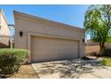 Charming home with a two-car garage and desert landscaping creates great curb appeal at 8725 E Vía Del Arbor --, Scottsdale, AZ 85258