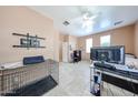 Bright bedroom with tile flooring, ceiling fan and open space at 10414 W Windsor Ave, Avondale, AZ 85392