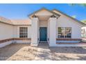 Inviting front entrance with a covered porch and stylish blue front door at 3608 W Fairview Ln, Chandler, AZ 85226