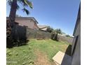 Spacious backyard with block fencing offering privacy at 3844 N 88Th Ln, Phoenix, AZ 85037