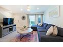 Comfortable living room featuring a stylish sectional sofa and sliding glass doors at 4600 N 68Th St # 351, Scottsdale, AZ 85251