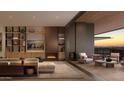 Modern living area with fireplace extending to an inviting outdoor lounge space at 5050 N Camelback Ridge Dr # 2306, Scottsdale, AZ 85251