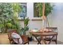 Close-up of patio seating with comfortable cushions, perfect for enjoying outdoor meals at 7511 S Parkcrest St, Gilbert, AZ 85298