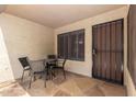 Relaxing covered patio with outdoor seating, perfect for enjoying the fresh air at 14300 W Bell Rd # 6, Surprise, AZ 85374