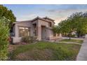 Lovely home with a well-kept lawn, attractive landscaping, and a desirable two-story design at 2109 W Wildhorse Dr, Chandler, AZ 85286