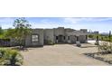 Modern home with a unique architectural style and desert landscaping at 38709 N 16Th Pl, Phoenix, AZ 85086