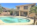 Backyard featuring a sparkling pool, patio, and balcony at 44583 W Sandstone Dr, Maricopa, AZ 85139