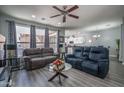 Open-concept living room and kitchen area, perfect for entertaining and Gathering gatherings at 8964 W Northview Ave, Glendale, AZ 85305