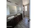 Elegant bathroom with dual sinks, granite countertops, and a luxurious feel at 625 W Mckellips Rd # 325, Mesa, AZ 85201