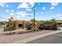 Beautiful home featuring desert landscaping, and an attached garage at 16927 E Trojan Ct, Fountain Hills, AZ 85268