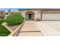 Charming single-story home with a welcoming arched entryway and a well-manicured front yard at 18820 N 33Rd Ave, Phoenix, AZ 85027
