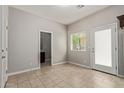 Living room leading to bathroom, kitchen, and backyard access at 2000 N 36Th St # 20, Phoenix, AZ 85008