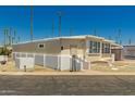 Well-maintained home showcasing its clean exterior and desert-friendly landscaping at 4065 E University Dr # 141, Mesa, AZ 85205