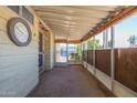 Enclosed patio featuring a cozy atmosphere, roll-down shades, and ample space for relaxation at 6960 W Peoria Ave # 74, Peoria, AZ 85345