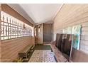 Charming entrance featuring brick walls, a patterned rug, and an inviting atmosphere at 8602 N 41St Ave, Phoenix, AZ 85051
