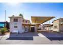 Charming single Gathering home with covered parking and a cozy front patio area at 17200 W Bell Rd # 1801, Surprise, AZ 85374