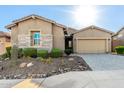 Charming home featuring desert landscaping and a neutral color palette at 23448 N 76Th Pl, Scottsdale, AZ 85255