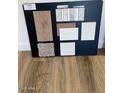 Sample of flooring and tiling with samples of interior decor colors at 24263 W Southgate Ave, Buckeye, AZ 85326
