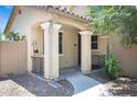 Inviting front exterior showcasing a charming porch and desert landscaping for low-maintenance appeal at 2715 N 73Rd Dr, Phoenix, AZ 85035