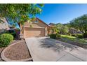 A well-maintained single-Gathering home with a two-car garage and attractive landscaping at 3147 E Vallejo Dr, Gilbert, AZ 85298