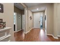 Inviting entryway with hardwood floors and a view of the front door at 37166 N El Morro Trl, San Tan Valley, AZ 85140