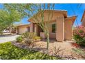 Charming exterior showcasing desert landscaping and a cozy front porch at 7413 W Southgate Ave, Phoenix, AZ 85043