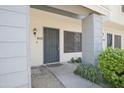 Townhouse exterior featuring a covered porch and desert landscaping for low maintenance at 7801 N 44Th Dr # 1036, Glendale, AZ 85301