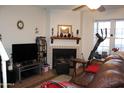 Spacious living room with a fireplace and a view of the backyard at 7977 W Wacker Rd # 196, Peoria, AZ 85381