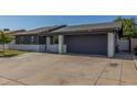 Charming single story home featuring a spacious driveway and a covered parking space at 845 E Hampton Ave, Mesa, AZ 85204