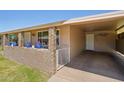 Exterior front view showing entry, carport and covered entry to home at 10431 W Roundelay Cir, Sun City, AZ 85351