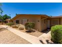 Inviting home featuring desert landscaping, a walkway, and an address plaque at 19685 N Star Ridge Dr, Sun City West, AZ 85375