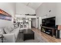 Spacious living room featuring an open floor plan, modern decor, and ample natural light at 2019 W Lemon Tree Pl # 1185, Chandler, AZ 85224