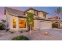 Charming front exterior of a two-story home with a well-maintained yard, two car garage, and lovely curb appeal at 3031 S Cortland --, Mesa, AZ 85212